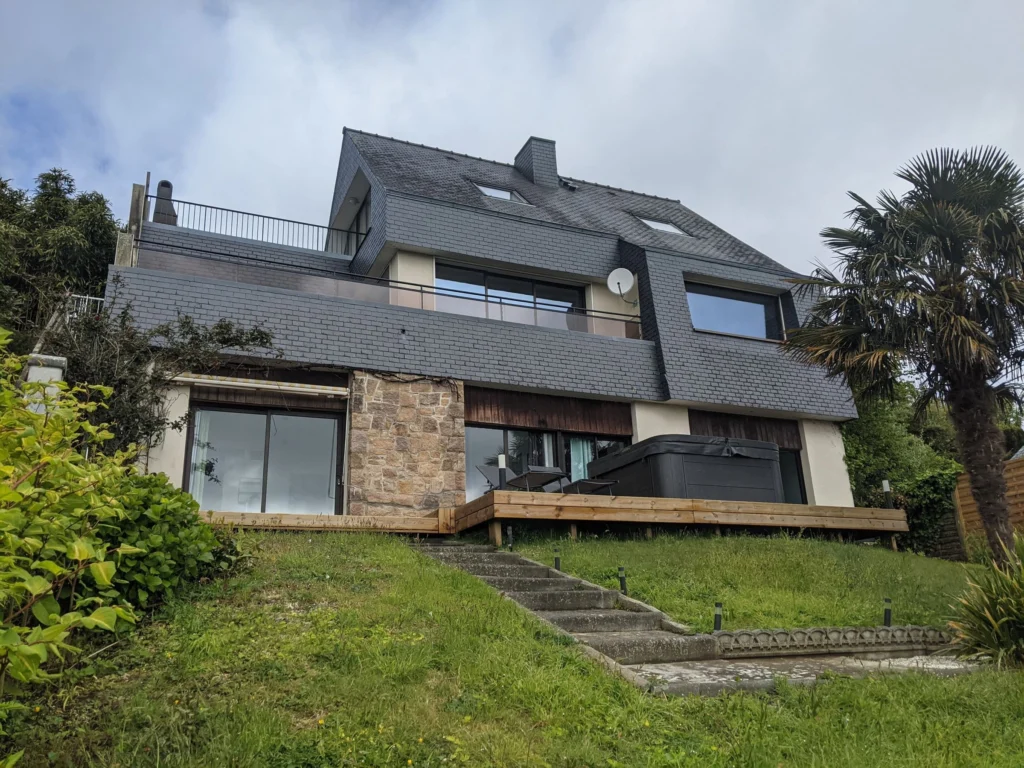 The garden-level home with its private garden and deck
